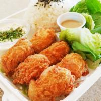 Oyster Katsu Plate · 6 pieces of fried breaded oyster katsu (Cutlet) with fresh tossed salad and furikake rice. C...