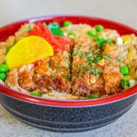 Pork Katsu Don · Bowl of rice topped with deep fried pork cutlet simmered in dashi based broth with onions, g...
