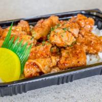 Spicy Chicken Bento · Spicy Chicken on a bed of rice or tossed salad.
Boneless Chicken meat stir fried with our ho...