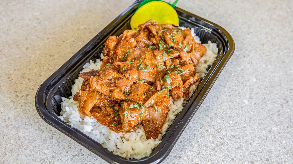 Spicy Pork Bento · Spicy Pork on a bed of rice or tossed salad.
Tasty pork meat stir fried with our house made spicy sauce.