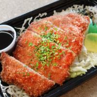 Tonkatsu Bento · 1 fillet of Tonkatsu (Pork cutlet) on a bed of furikake rice or tossed salad. Crispy and jui...