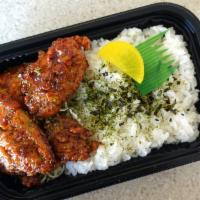 Fried Spicy Chicken Bento · 3pc of fried spicy boneless chicken on a bed of rice or tossed salad. Soy sauce based sweet ...