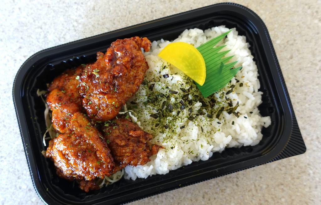 Fried Spicy Chicken Bento · 3pc of fried spicy boneless chicken on a bed of rice or tossed salad. Soy sauce based sweet and spicy sauce marinated chicken.