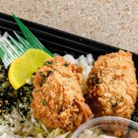 Oyster Katsu Bento · 3 pieces of fried breaded oyster katsu (Cutlet) with furikake rice or tossed salad. Comes wi...