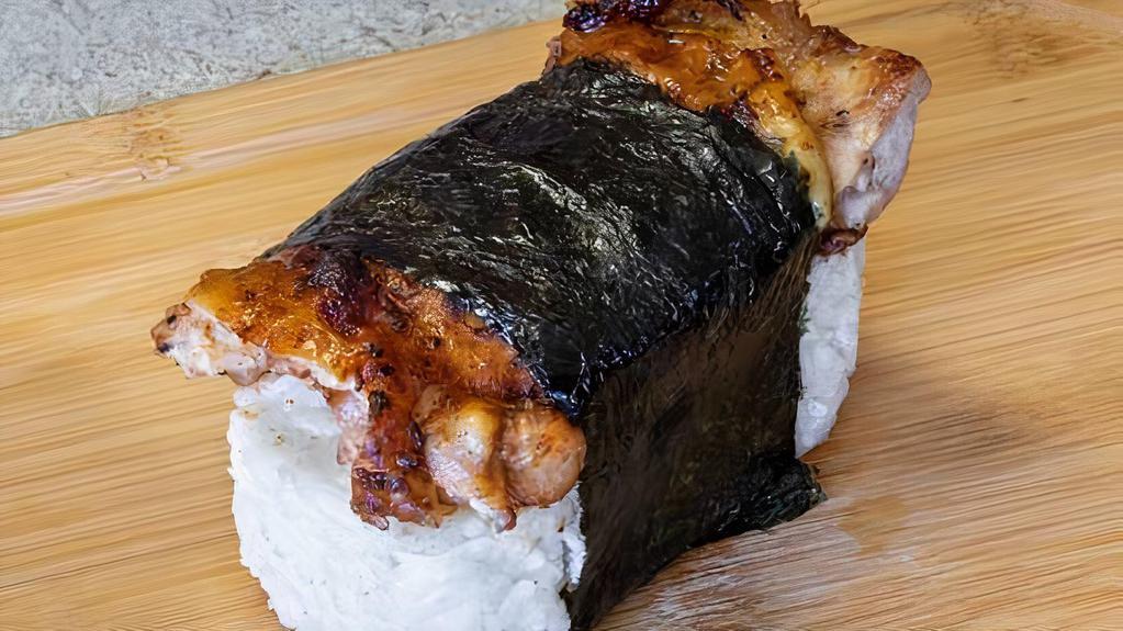 Sumo Musubi (Bbq Chicken) · BBQ chicken on top of white rice.