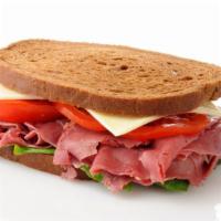 The Clipper Sandwich · Hot corned beef, Swiss cheese, lettuce, tomatoes, sauerkraut and ranch dressing on your choi...