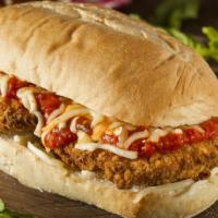The Shaggy Sandwich · Chicken cutlet, mozzarella, grilled onions and peppers, and marinara sauce on your choice of...