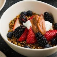 Chia Muesli · Almond Milk Soaked Chia Seeds, Rhubarb Compote, Apple, Granola, Cranberries, Dates, Blueberr...