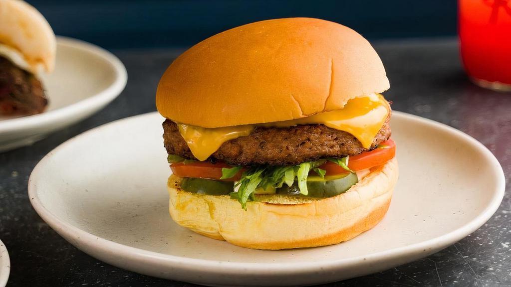 Beyond Burger · Beyond (Vegetarian) Pattie, Lettuce, Tomato, Onions, Pickles, American Cheese & Special Sauce On A Potato Bun.