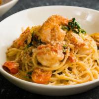 Shrimp Pasta · Grilled Shrimp, Spaghetti, Chili Flakes, Cream, Cherry Tomatoes, Arugula, Breadcrumbs.