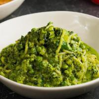 Pesto Pasta · Creamy Pumpkin Seed Pesto (Nut Free), Spaghetti, Baby Peas, Zucchini, Snap Peas, Kale, Parme...