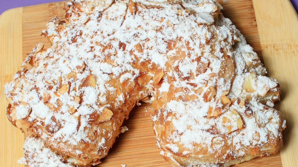 Bear Claw · Our best selling pastry! A Danish filled with a delicious almond butter paste topped with sliced almonds and powdered sugar.