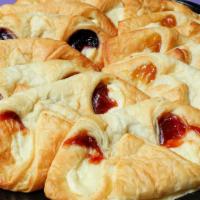 Fruit Danishes · Cream cheese with guava, mango and blueberry in a danish.