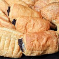 Croissants · 128 layered flaky, buttery croissants come plain, filled with chocolate fudge, and spinach, ...