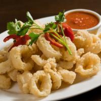 Calamari · Lightly fried calamari topped with cherry peppers.