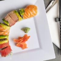 Rainbow Roll · yellow tail, salmon, tuna on top with cucumber & avocado inside