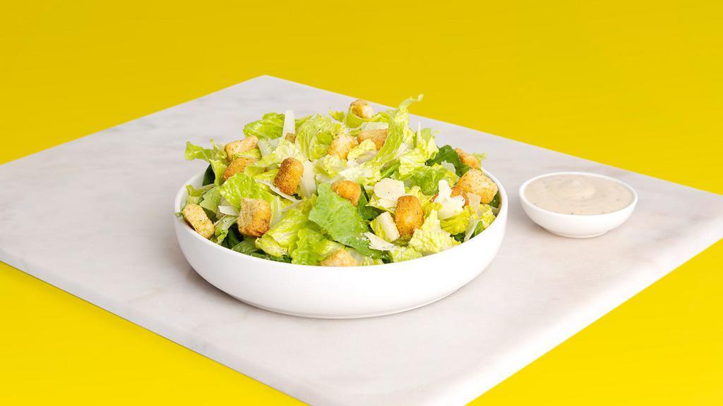 Caesar Salad · Caesar salad with parmesan cheese, croutons, and Caesar dressing on the side.