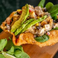 Quinoa Salad · Black beans, avocado, roasted corn, tomato, onions, bell peppers, cilantro, jalapeño, lime.