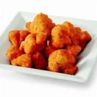 Buffalo Cauliflower Bites · Crispy mild Spicy Battered Cauliflower with Aleppo Pepper.