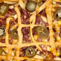 Southwest Fries · Our signature extra crispy fries topped with bacon, cheddar, mozzarella, jalapeno, chipotle ...
