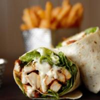 Grilled Chicken Caesar Wrap - · Grilled chicken, romaine, parmesan cheese and Caesar dressing and side of fries.