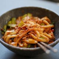 Tingy Tangy (Vegan) · udon noodles, baby bok choy, kimchi, coriander, gochugaru chili flakes, crispy shallots, gar...