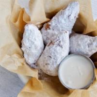 Zeppoles  · Crispy on the outside, yet light and fluffy on the inside. These mini Italian donut holes wi...