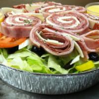 Antipasto Salad  · Chopped cured meats, fresh cheeses, and briny olives.