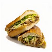 Cuban Style Sandwich · Tropical style cuban, comes with delicious pulled pork slowly baked to perfection, swiss che...