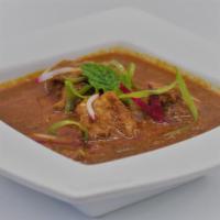 Andhra Chicken Curry · Classic andhra style chicken curry cooked with traditional spices in a onion and tomato base...