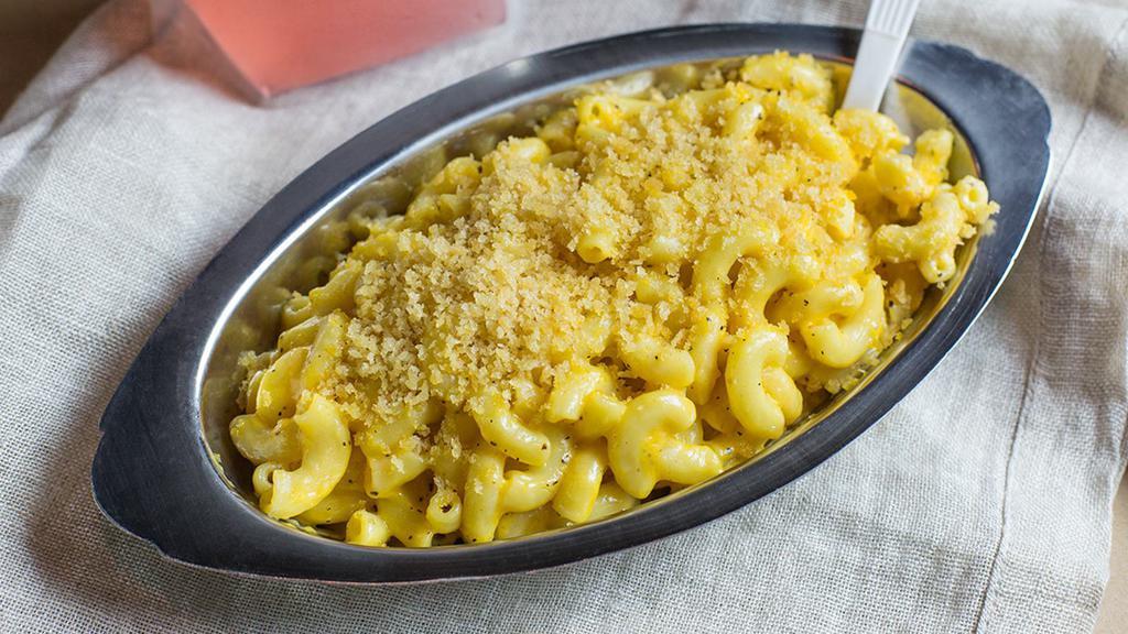 Mac N Cheese · white cheddar mac, topped with ritz crumbs