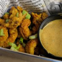 Popcorn Crawfish · Lightly breaded crawfish tails, served with spicy ranch.