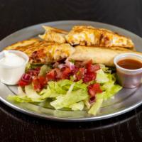 Chicken Quesadilla · Grilled flour tortilla with melted monterey jack and cheddar cheese, pico de gallo with a si...