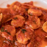 Shrimp Marinara · With two clams in a mild marinara sauce