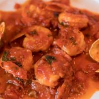 Shrimp Fra Diavolo · With two clams in a spicy marinara sauce.