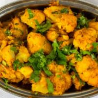 Aloo Gobi Ghar Ki · Roasted cauliflower, potatoes and spices.
