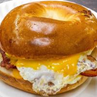 Bacon Egg And Cheese On A Roll · Choice of fried scrambled over easy or sunny side up eggs