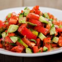 Shepherd Salad · Fine chopped tomatoes, green peppers, cucumbers, onions, dill, parsley tossed with olive oil...
