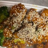 Sesame Chicken · Chunks of chicken deep-fried in chef's special sauce.