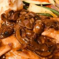 Chicken Marsala · With Mushrooms and Mashed Potatoes.
