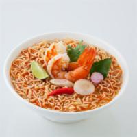 Burning Noodles · Noodles with fresh and preserved vegetables and peanuts dressed with a spicy and salty sauce.