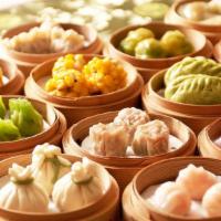 Chicken Shao Mai (6 Pcs.) · Delicate steamed dumplings filled with minced chicken, ginger and scallions.