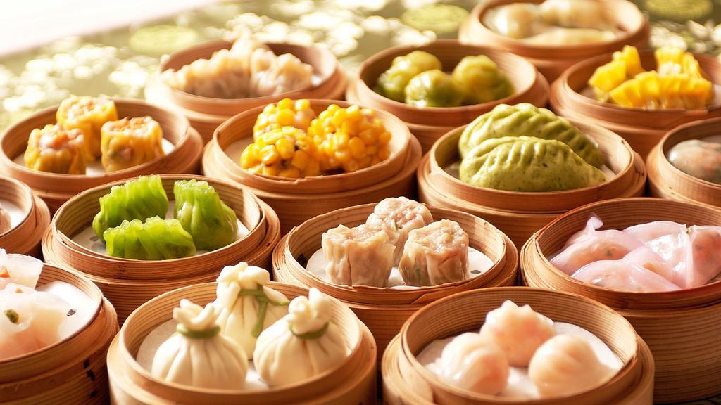 Chicken Shao Mai (6 Pcs.) · Delicate steamed dumplings filled with minced chicken, ginger and scallions.