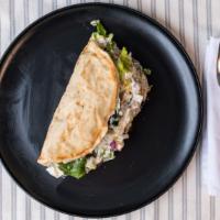 Falafel Gyro · All natural fried chick peas on a pita that comes with lettuce, tomato, onions, cucumbers an...