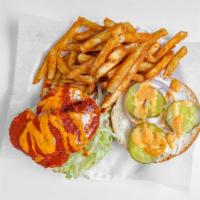 Spicy Chicken Sandwich · Halal spicy chicken sandwich  with lettuce, tomato, onions, pickles and topped off with munc...