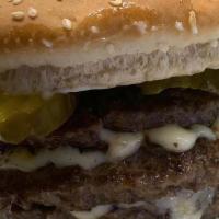 Double Cheeseburger & Fries Combo · Includes a can soda.