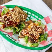 Take A Bao* · Two Steamed Buns; Choice of Pork, Chicken, or Shrimp, with Lettuce, Spicy Mayo, Teriyaki Sau...