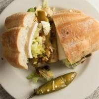 Tortas / Mexican Sandwiches · Lechuga, tomate, aguacate, jalapeño, mayonesa, mostaza, salsa de tomate y queso. / Lettuce, ...