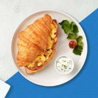 Egg Stop Croissant & Salad · Two cage free scrambled eggs, Swiss cheese, chipotle mayo served in a croissant with a side ...