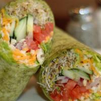 California Wrap / Sandwich · Grilled chicken mixed with guacamole, fresh mixed greens and Asiago. Served with your choice...